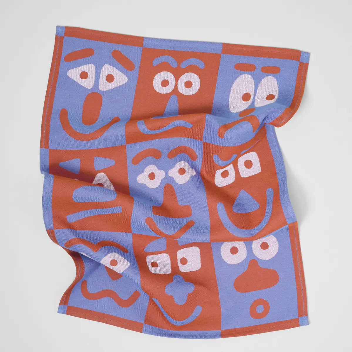 Making Faces Blue/Brown Tea Towel